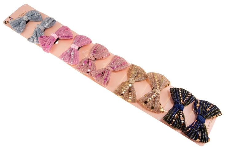 Górniaki z kokardkami ozdobionymi cekinami